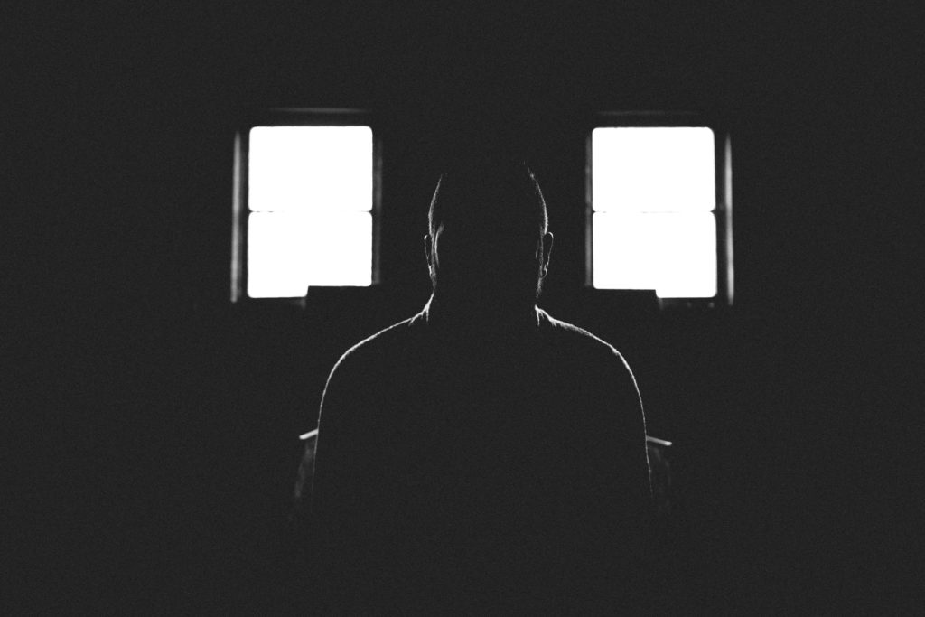 Man sitting in the dark